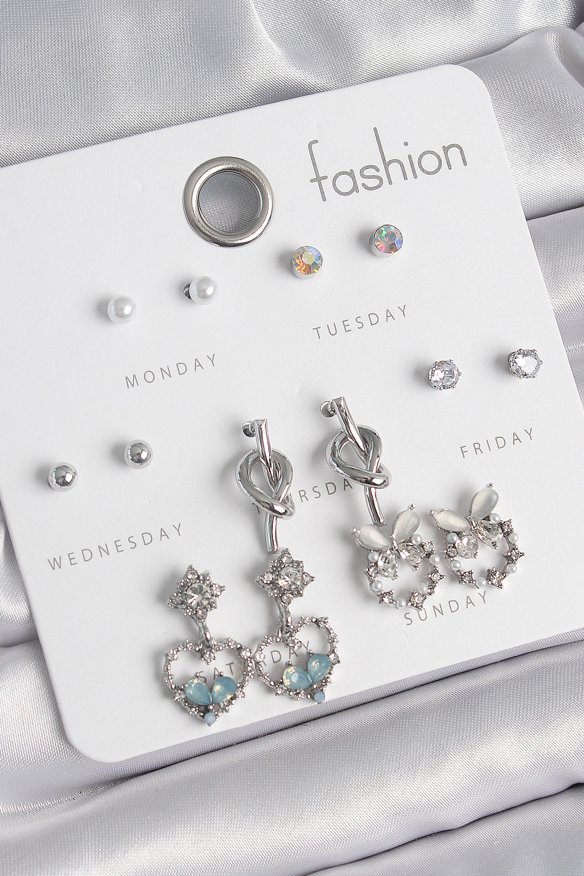 Pirinç Gümüş Renk Sallantı Zirkon Taşlı Kalp Model Düğüm Detay 7 Çift Kadın Küpe Seti BKP10548