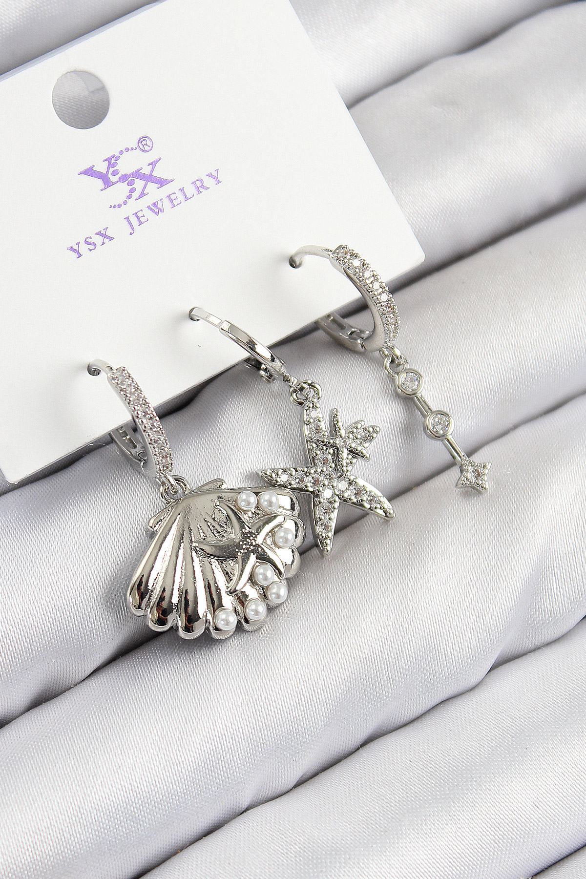 Pirinç Zirkon Taşlı 3'lü Yıldız Ve İstiridye Model Gümüş Renk Kadın Küpe BKP11131