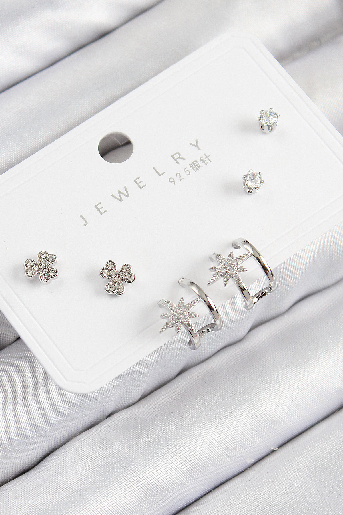 Pirinç Zirkon Taşlı Kutup Yıldızı Model Gümüş Renk 925 Ayar Gümüş Çivi Kadın Küpe Set BKP11167